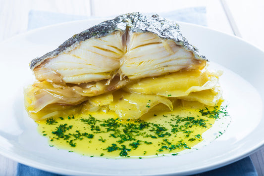 Salted Cod with Scalloped Potatoes in a Extra Virgin Oil sauce.