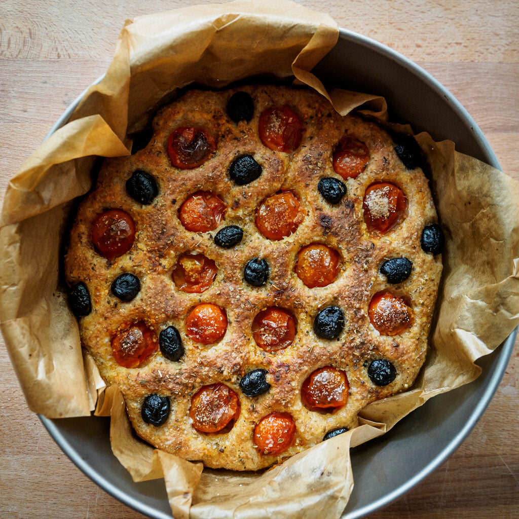 Heavenly Focaccia bread with tomato and olives